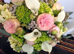 A lush bouquet of pinks and greens from a recent wedding