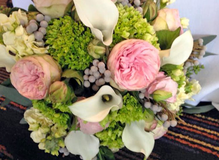 A lush bouquet of pinks and greens from a recent wedding